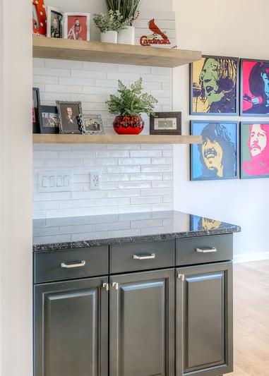 Buffet kitchen cabinets with open shelving above, cabinets are painted sherwin williams greenblack.
