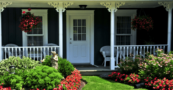 Exterior porch and door painted white.