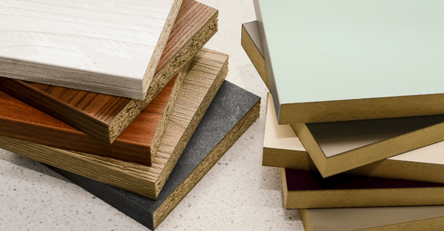 MDF wood stacked with different colors and stains on the wood pieces.