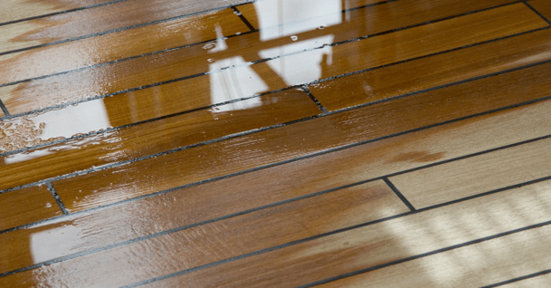 Wet stain on a wood deck.