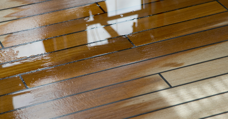 Wet deck after ice melted with salt outside of a home in Omaha, NE.