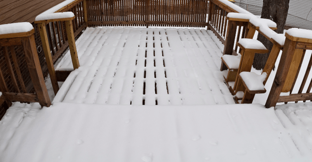 Snow on a wood deck in omaha, NE,.