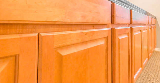 Bright golden oak cabinets with middle panels.