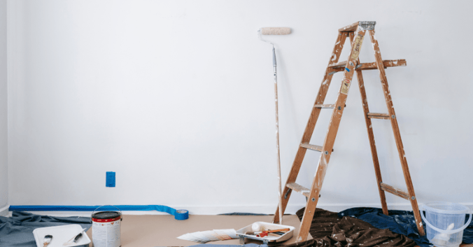 Interior paint set up in a room painted white.