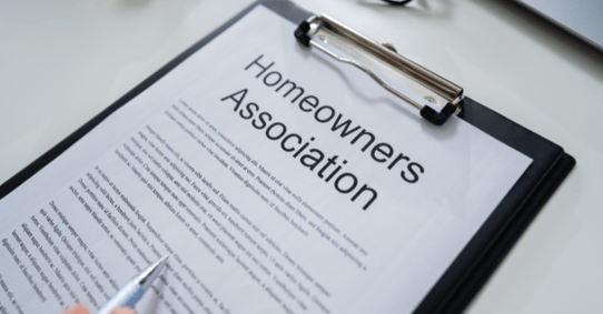 Paper on a clipboard that says "Homeowners Association".
