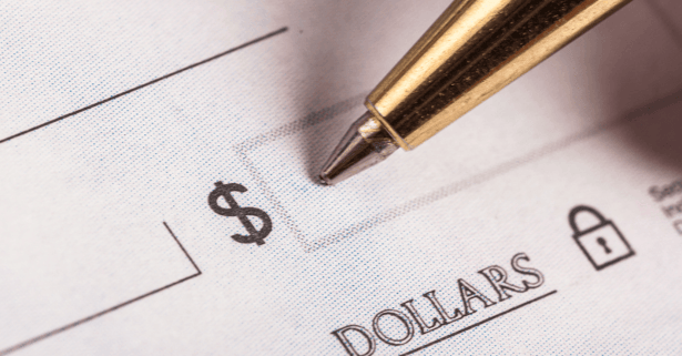 Close up of dollar box being written with a pen for painting deposit.
