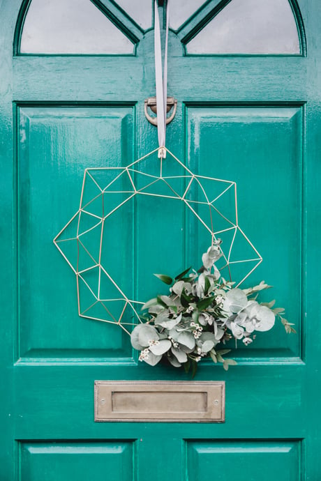 Close up of a turquoise front door