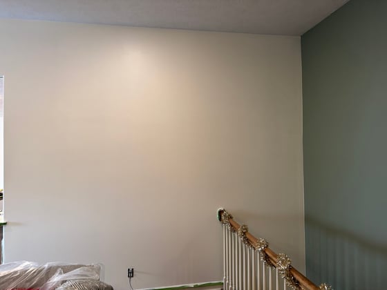 Wall painted in White Chocolate OC 127 by Benjamin Moore.