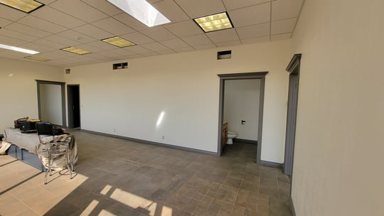 Office walls painted with white paint and grey paint on trim.
