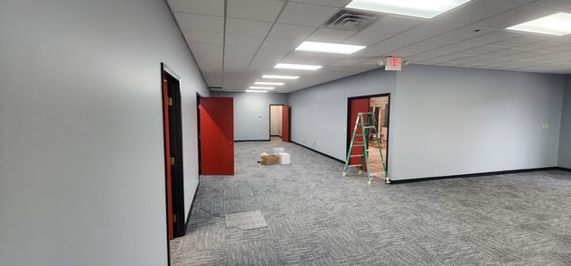 Greyish colored walls in an office building in Omaha, NE.