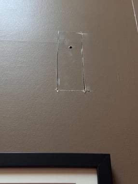 Cut out in wall before fixing and painting.