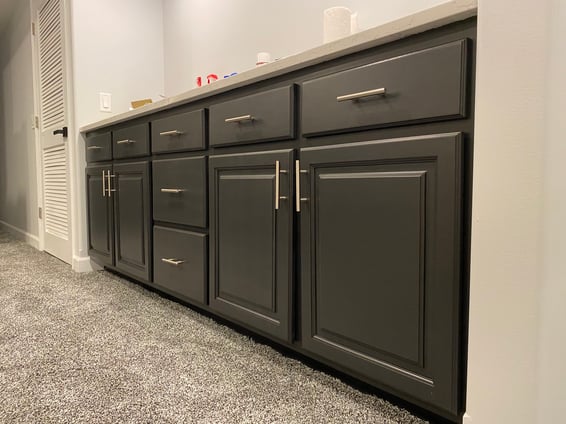 Lower cabinets painted a dark black with silver handles in Omaha, NE.