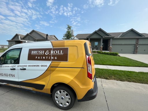 Brush & Roll Painting van outside of a customers house for an exterior painting project.