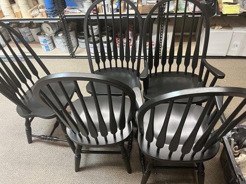 5 dining room table chairs freshly painted black.