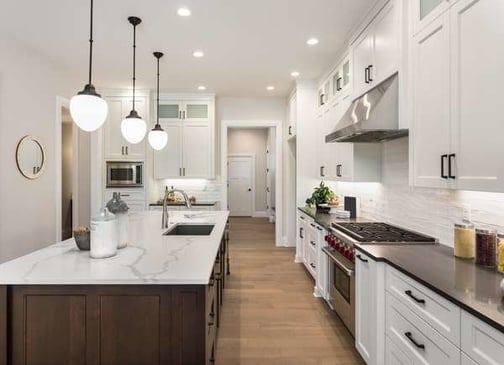 White cabinets with white kitchen walls