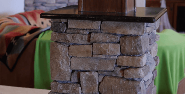 Stone pillar sealed with a clear coat of paint.