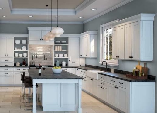 Light blue walls with white kitchen cabinets