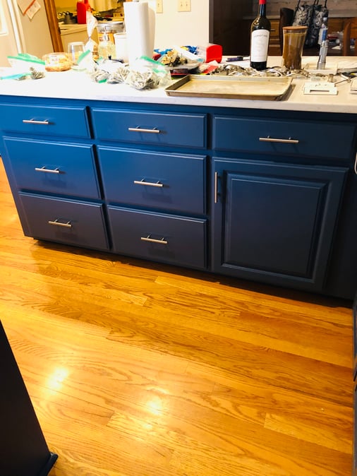 Brush & Roll Painting navy blue cabinets
