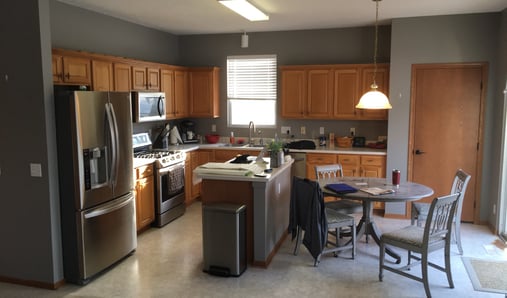 Before: kitchen with oak cabinets