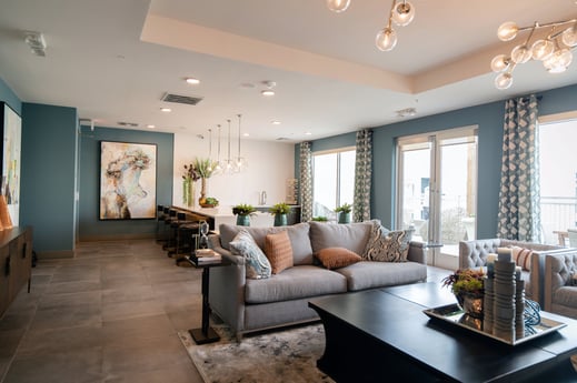 Transitional living room with blue walls