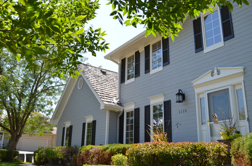 Exterior home with gray and navy paint