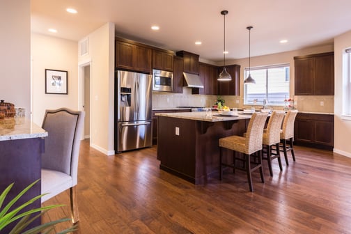 Kitchen with dark stained cabinets