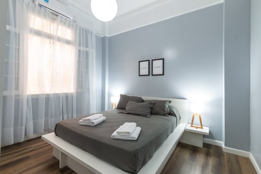 Bedroom with blue painted walls