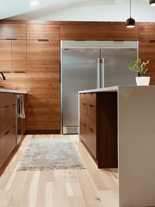 Contemporary kitchen cabinets finished in oak