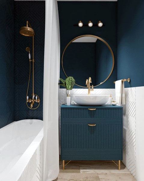 Navy blue painted small bathroom