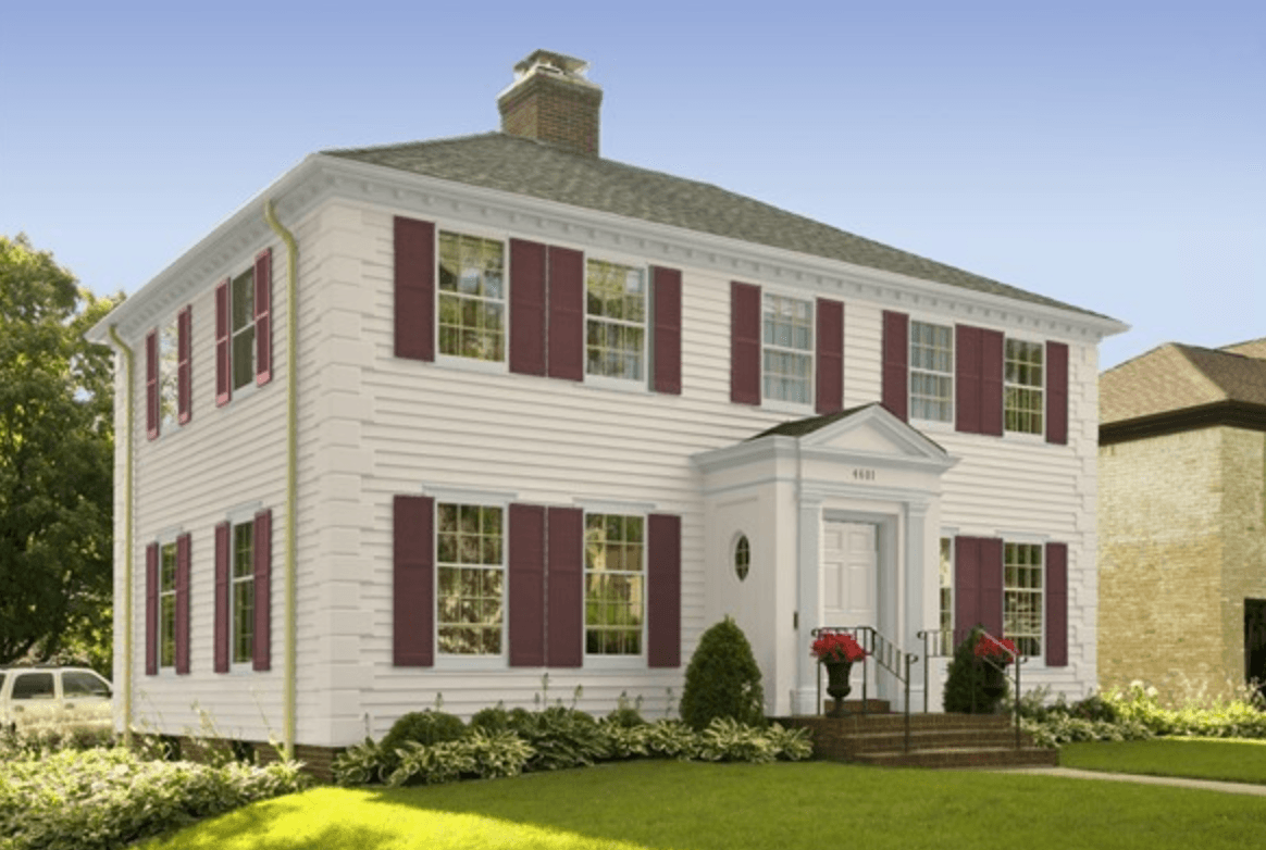 Exterior of house digital render with white paint on trim and siding and dark maroon shutters painted.