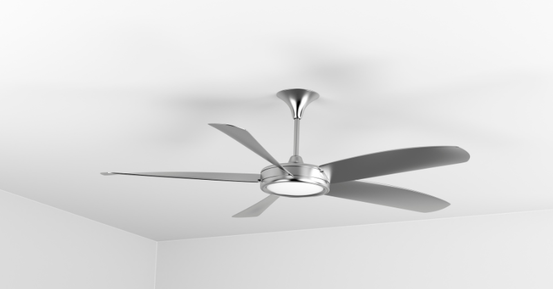 White ceiling and walls with ceiling fan on top.