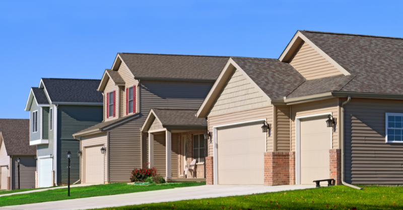 HOA neighborhood with beige and light brown homes.