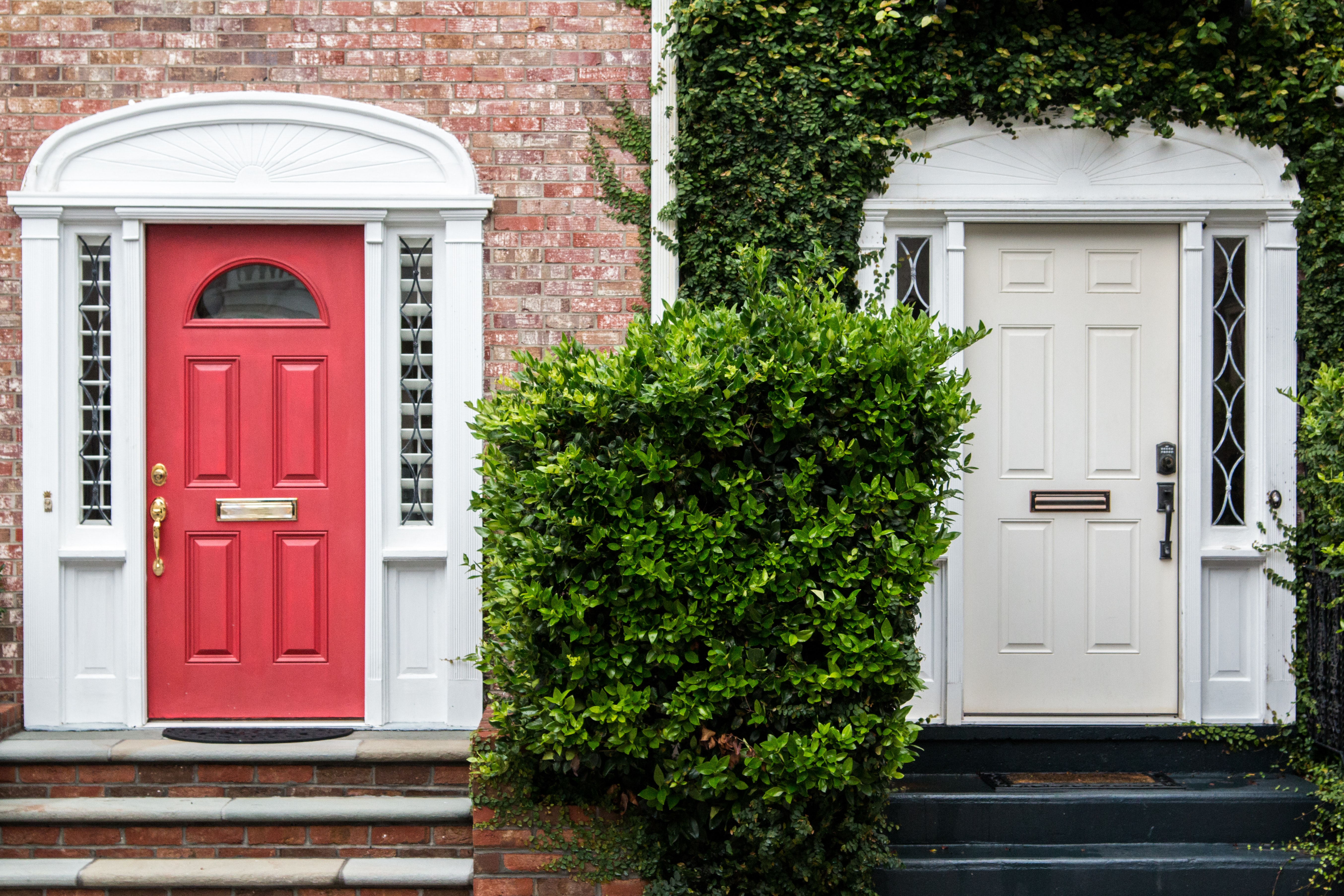 Red and white painted front doors.